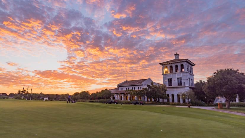 A clubhouse on the coast at sunset